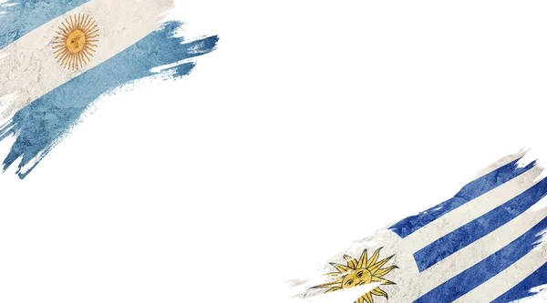 Beyaz Arkaplanda Arjantin ve Uruguay Bayrakları — Stok fotoğraf
